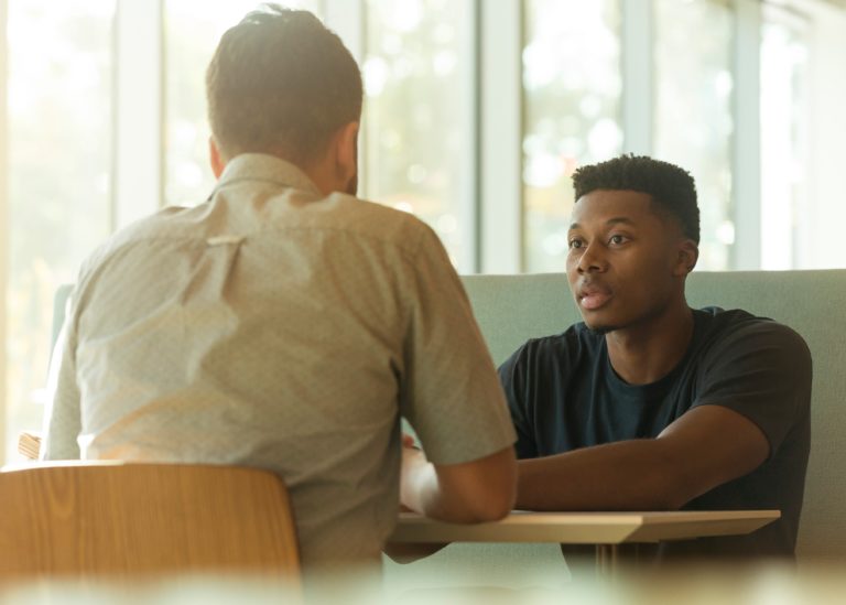 two men talking